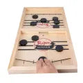 New Sling Puck Game with Free 10 piece of pluck and high Quality wood at reasonable price